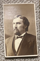 The original tiny faded photograph of Rufus